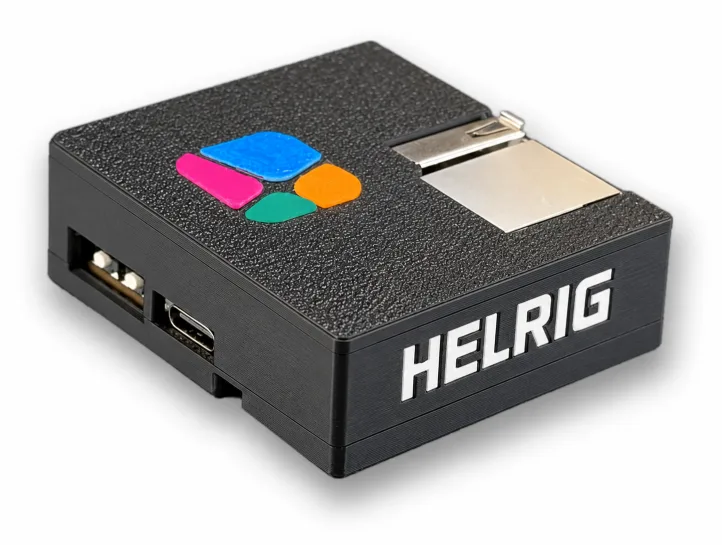 The Helrig Box: a small black 3D-printed case with the Helrig logo on top and HELRIG on the side